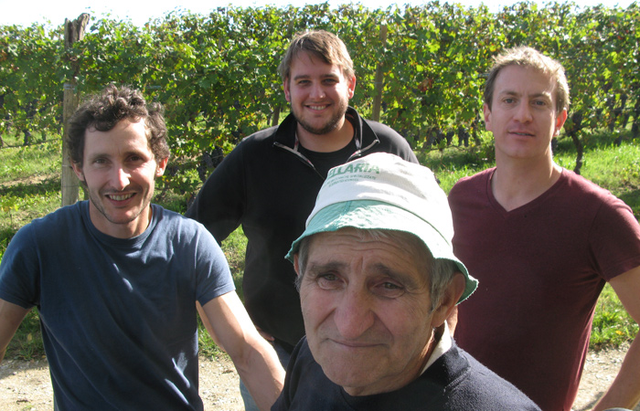 Vineyard owners Nico  and his father Giovanni  with Will and Gavin (back row,   left and right)