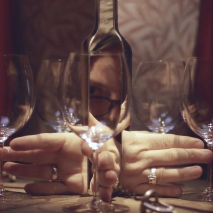 The technique used by filmmakers Iain and Jane in 2019 involved mirrors to create illusions of multiple wine glasses